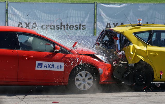 red car crashing into back of yellow car